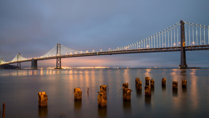 Fototapeta na wymiar San Francisco Bay bridge. Also known as the San Francisco - Oakland Bay Bridge, is a complex of bridges spanning San Francisco Bay, California, United States of America