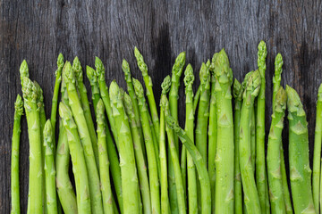Raw asparagus. Fresh Asparagus on wooden background