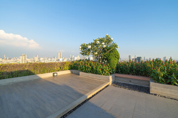 Sky garden on private rooftop of condominium or hotel, high rise architecture building with tree,...