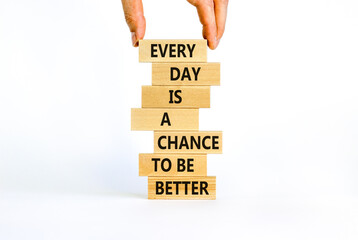 Chance to be better symbol. Wooden blocks with words Every day is a chance to be better. Beautiful white background, copy space. Businessman hand. Business, motivational chance to be better concept. - obrazy, fototapety, plakaty