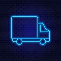 Neon truck element. The concept of delivery of large loads, transport. Retro light sign on dark background
