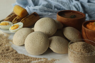 Steamed Little millet cakes or little millet idli. Made with a fermented batter of little millet, lentils. Served with coconut chutney and steamed plantain