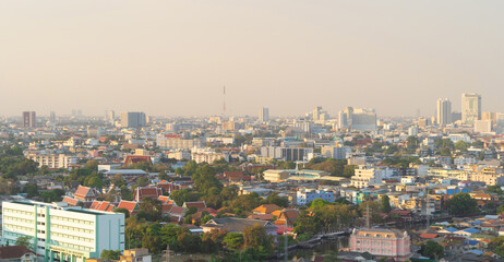 Aerial view of Bangkok Downtown Skyline, Thailand. Financial district and business centers in smart urban city in Asia. Skyscraper and high-rise buildings at sunset.
