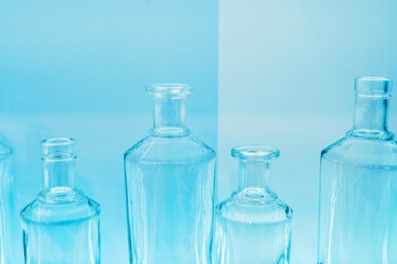Fragments of glass bottles of different shapes in retro style. Soft focus. flat lay frame
