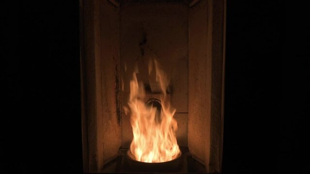 Close up of cozy fire in pellet stove