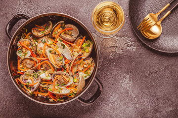 Shells vongole venus clams with vegetables and herbs
