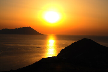 Beautiful sunset from Plaka main village of Milos island, Cyclades, Greece