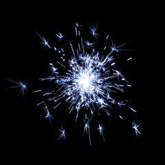Fototapeta premium Bright sparks against black background