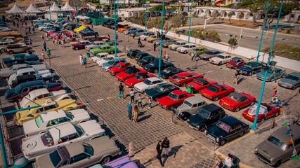 drone aerial high angle photo of colourful car expo in Ayia Napa cyprus