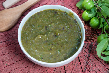 Tkemali - green plum sauce, seasoned with herbs 