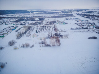 Fototapeta na wymiar winter panoramas of the Russian village