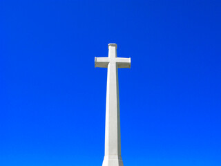 White marble cross in the sky