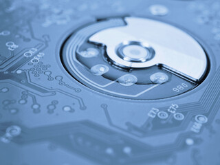 Printed circuit board hard drive. Fragment of printed wiring board close-up. Conductive patterns....