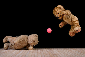 Teddy bears playing soccer