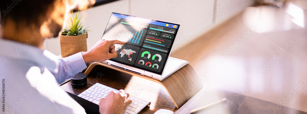 Aufkleber African Businessman Using Analytics Data KPI Dashboard