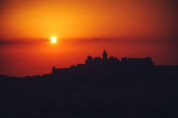Obraz premium sunset above castle