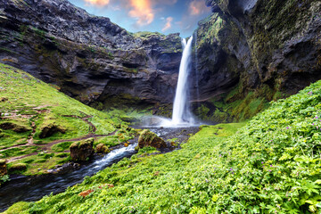 Naklejka na ściany i meble Stunning Iceland nature landscape. Popular touristic location Kvernufoss waterfall. Best famouse travel area. Scenic Image of Iceland. Iceland is one most popular country for landscape photographers