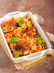 Chicken thighs with carrot bulgur