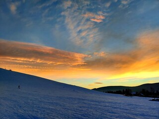 Sunset un the snow montain 