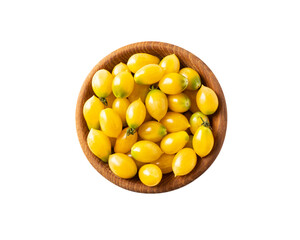 Yellow tomatoes lay on white background. Top view. Cherry tomatoes on a wooden bowl isolation. Baby tomatoes isolated on a white background.