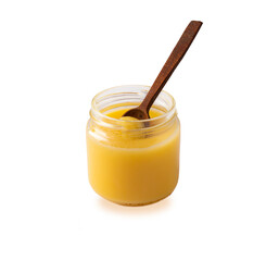 Ghee or clarified butter in jar, cooking oil, pure ghee isolated on white background. Jar and measuring wooden spoon of ghee - clarified butter wooden spoon isolated on white background.