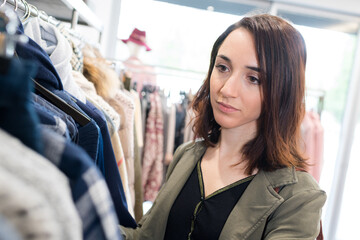 happy woman shopping for clothes