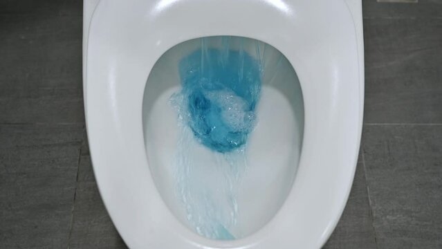 Flushing down with cleaner water in toilet