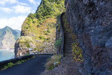 Dangerous part of the old road with rockfall