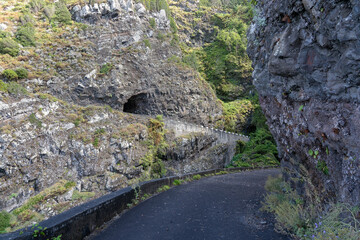 Dangerous part of the old road with rockfall