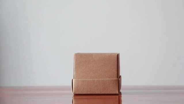 Put a paper heart in a box, deliver love and care. valentine's day