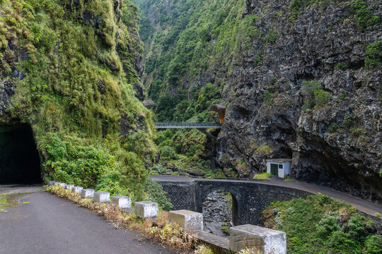 Dangerous part of the old road with rockfall