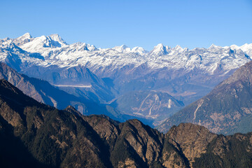 Fototapeta premium Viewpoint in the himalaya mountains with a view to tibet. Tamang Heritage Trail and Langtang trek day 3 from Nagthali to the viewpoint Nagthali Gyang, Nepal