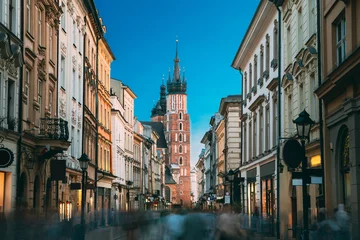 Fotobehang Krakow, Poland. View Of St. Mary's Basilica From Florian Street. Famous Landmark Old Landmark Church Of Our Lady Assumed Into Heaven. Saint Mary's Church. UNESCO World Heritage Site © Grigory Bruev