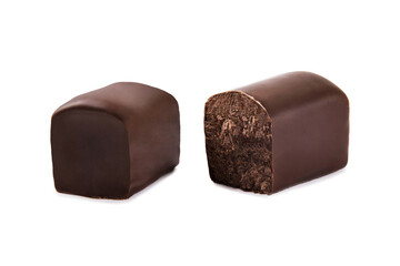 Glazed chocolate cheese in milk chocolate broken into halves on a white background
