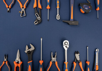 Work tool on blue background. Hand tool new set for repair and construction, overhead