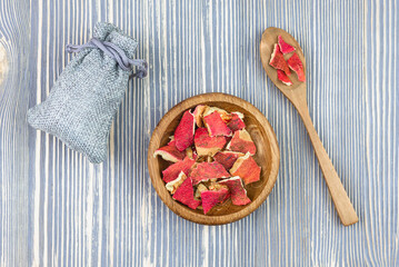 Peel (zest) from a pomegranate. Dry grass. Healing herbs.