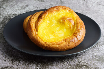 Sweet and traditional ensaimada covered with burnt cream.