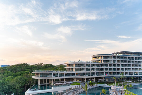 Luxury Mexican beach Hotel resort at sunset, horizontal image