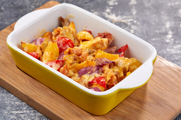 roasted vegetables with meat and cheese