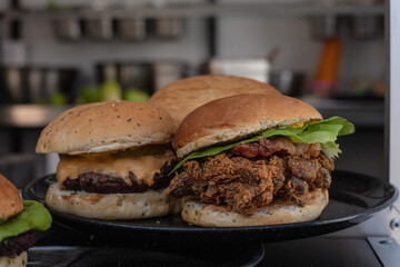 Burgers served on a black plate