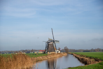 Naklejka premium dutch windmill in the country