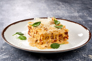 italian lasagna on the white plate