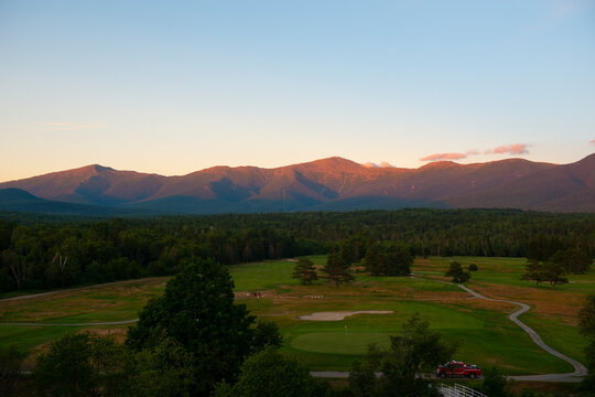 Presidential Range including Mount Jefferson, Mount Adams, Mount Madison and the highest Mount Washington at sunset from village of Bretton Woods, White Mountains, New Hampshire NH, USA. 