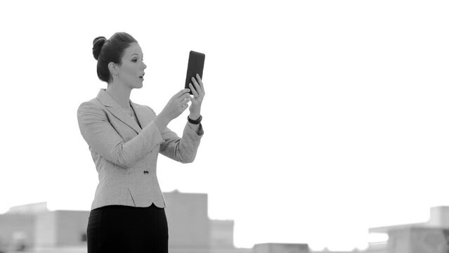 Businesswoman talking on tabled Black and White