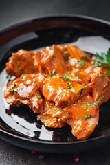 meat tomato sauce spezzatino pork beef lamb fresh portion dietary healthy meal food diet still life snack on the table copy space food background rustic top view keto or paleo diet