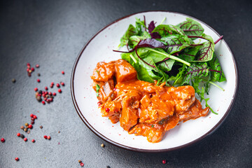 meat tomato sauce spezzatino pork beef lamb fresh portion dietary healthy meal food diet still life snack on the table copy space food background rustic top view keto or paleo diet