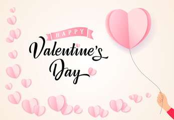 Valentines Day lettering, hand with paper heart balloon and pink flying heart. Valentine's Day postcard with elegant calligraphy and origami paper flying elements. Vector symbols of love