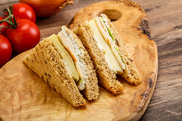 Club sandwich with chicken and cheese