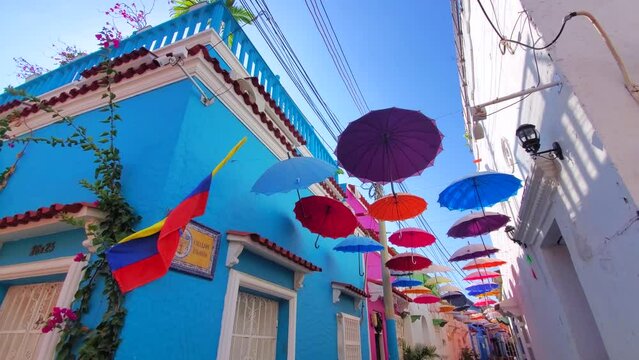 Cartagena, Colombia, 18 October, 2021: Scenic colorful streets of Cartagena in historic Getsemani district near Walled City, Ciudad Amurallada
