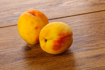 Two Sweet ripe tasty peaches